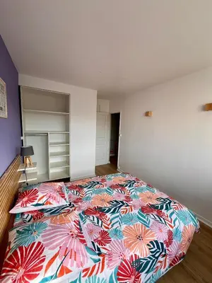 Un ou plusieurs lits dans un hébergement de l'établissement Chambre privée dans un appartement partagé