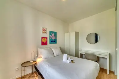 Un ou plusieurs lits dans un hébergement de l'établissement L'Amandier - Superbe appart au coeur de Lyon 5