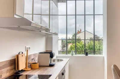 Cuisine ou kitchenette dans l'établissement L'Amandier - Superbe appart au coeur de Lyon 5