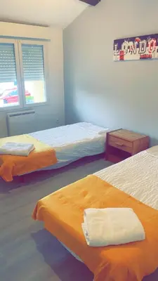 Un ou plusieurs lits dans un hébergement de l'établissement Maison de charme Saint euphémie 2