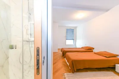 Coin salon dans l'établissement Duplex neuf et très lumineux en plein centre ville