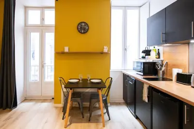 Cuisine ou kitchenette dans l'établissement L'Opéra 10 - Beau studio avec balcon - Opéra