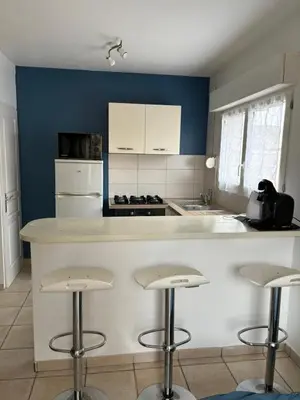 Cuisine ou kitchenette dans l'établissement Charme C