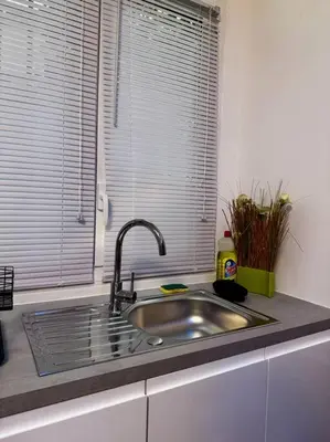 Cuisine ou kitchenette dans l'établissement Le Vitton - Appartement proche Gare PartDieu