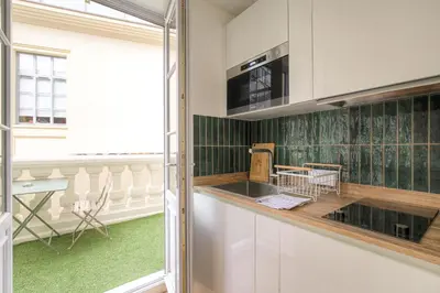 Cuisine ou kitchenette dans l'établissement Joli studio climatisé avec terrasse - Lyon centre
