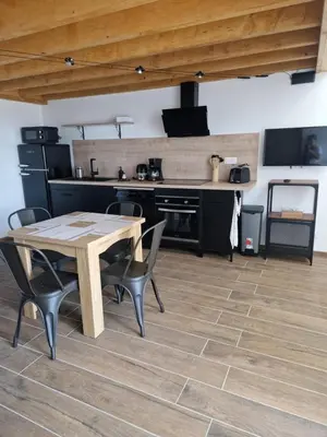 Cuisine ou kitchenette dans l'établissement La Forge