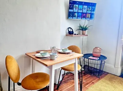 Coin salon dans l'établissement Studio central et confortable