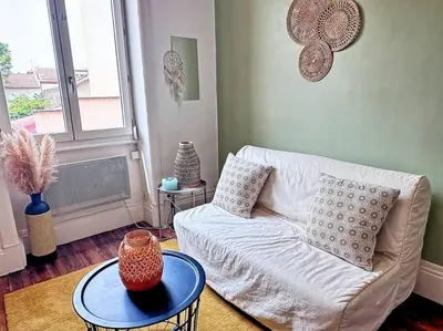Coin salon dans l'établissement Studio central et confortable
