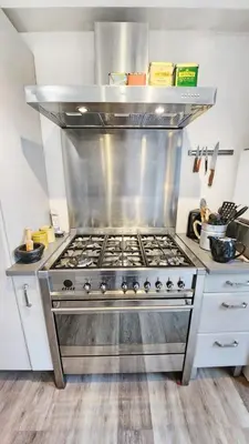 Cuisine ou kitchenette dans l'établissement Oasis Citadine