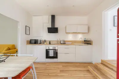 Cuisine ou kitchenette dans l'établissement Maison avec terrasse proche Lyon