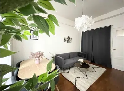 Coin salon dans l'établissement Appartement Brunard