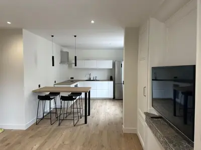 Cuisine ou kitchenette dans l'établissement Appartement Brignais Centre en face du pont romain
