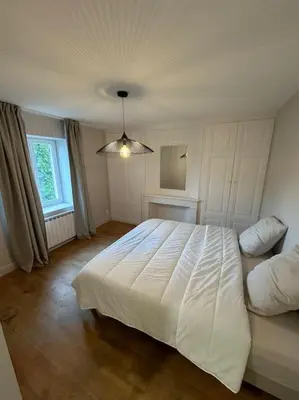 Un ou plusieurs lits dans un hébergement de l'établissement Appartement Brignais Centre en face du pont romain