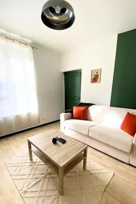 Coin salon dans l'établissement City Nest Cosy et Spacieux
