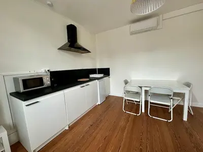 Cuisine ou kitchenette dans l'établissement L'oasis Groupama stadium OL et LDLC Arena
