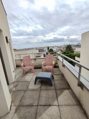 Balcon ou terrasse dans l'établissement HOMEYPIC Villeurbanne T4 proche INSA