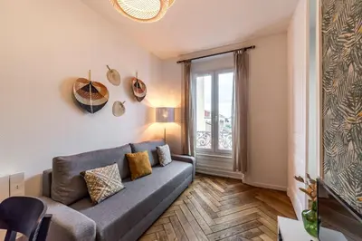 Coin salon dans l'établissement All in Lyon | Le Petit Gone – Cosy & calme