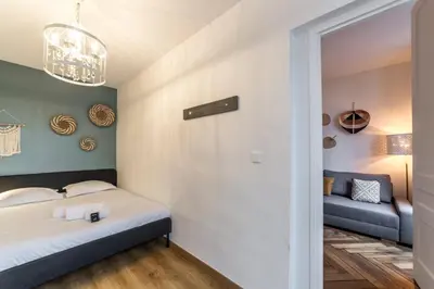 Un ou plusieurs lits dans un hébergement de l'établissement All in Lyon | Le Petit Gone – Cosy & calme