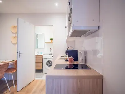 Cuisine ou kitchenette dans l'établissement Le Cosy Express