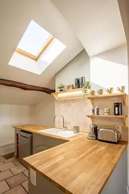 Cuisine ou kitchenette dans l'établissement Au Milieu des Secrets