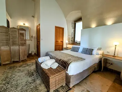 Un ou plusieurs lits dans un hébergement de l'établissement Les Chambres De La Renaissance