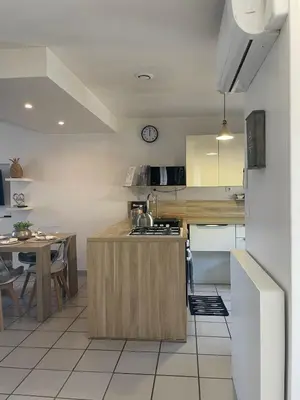 Cuisine ou kitchenette dans l'établissement Nid douillet a la campagne