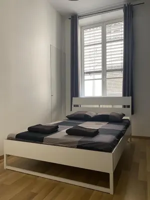 Un ou plusieurs lits dans un hébergement de l'établissement Appartement hyper centre