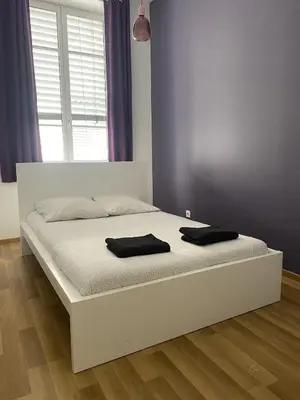 Un ou plusieurs lits dans un hébergement de l'établissement Appartement hyper centre
