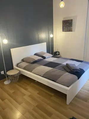 Un ou plusieurs lits dans un hébergement de l'établissement Appartement hyper centre
