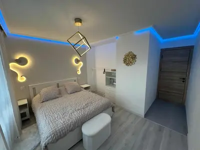 Un ou plusieurs lits dans un hébergement de l'établissement Appartement luxe Chateaucreux