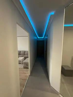 Coin salon dans l'établissement Appartement luxe Chateaucreux