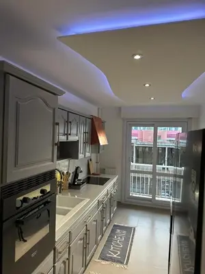 Cuisine ou kitchenette dans l'établissement Appartement luxe Chateaucreux
