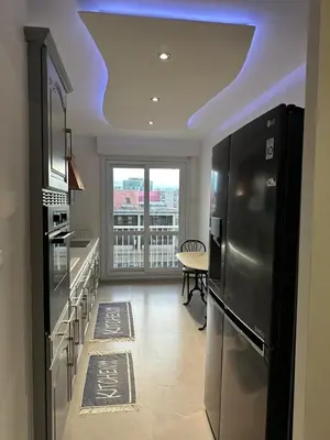 Cuisine ou kitchenette dans l'établissement Appartement luxe Chateaucreux