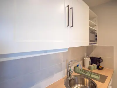 Cuisine ou kitchenette dans l'établissement Le cosy Twin