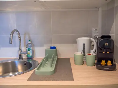 Cuisine ou kitchenette dans l'établissement Le cosy Twin