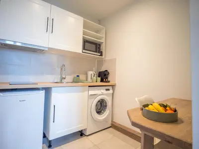 Cuisine ou kitchenette dans l'établissement Le cosy Twin