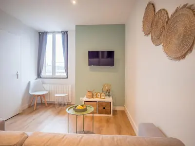 Télévision ou salle de divertissement dans l'établissement Le cosy Twin