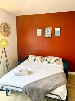 Un ou plusieurs lits dans un hébergement de l'établissement Le Courvoisy, Studio avec piscine, près Groupama Stadium et Salle Arena