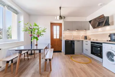 Cuisine ou kitchenette dans l'établissement Le Cocon