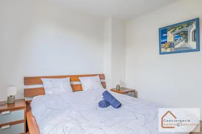 Un ou plusieurs lits dans un hébergement de l'établissement Maison Évasion - Piscine, Jardin & Barbecue
