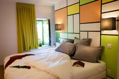 Un ou plusieurs lits dans un hébergement de l'établissement Les chambres de l'Alouette