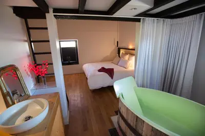 Un ou plusieurs lits dans un hébergement de l'établissement Les chambres de l'Alouette