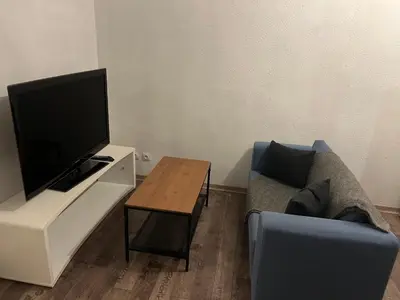 Télévision ou salle de divertissement dans l'établissement T2 saint priést