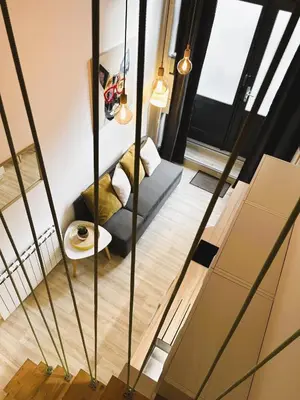 Un ou plusieurs lits dans un hébergement de l'établissement Appartement Canut Lyon Croix-Rousse