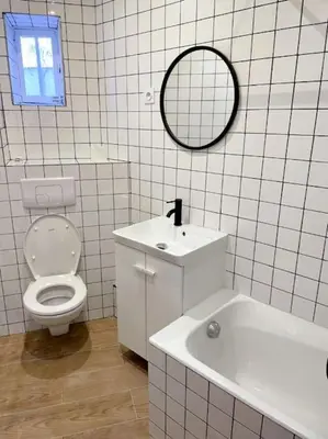 Salle de bains dans l'établissement Appartement Charpenne