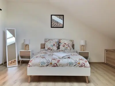 Un ou plusieurs lits dans un hébergement de l'établissement Appartement spacieux et lumineux proche gare