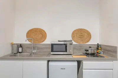 Cuisine ou kitchenette dans l'établissement Le Cléret, Studio douillet sous les toits