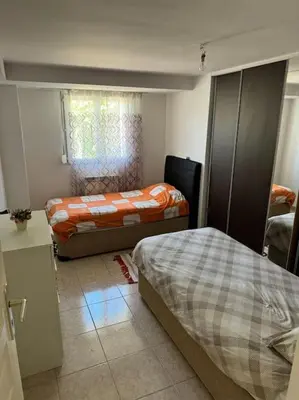 Un ou plusieurs lits dans un hébergement de l'établissement Maison avec Jardin Bron Centre Proche EUREXPO
