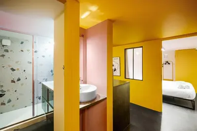 Un ou plusieurs lits dans un hébergement de l'établissement SmartStay Bird Family - X Rousse