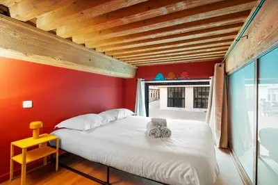 Un ou plusieurs lits dans un hébergement de l'établissement SmartStay Bird Family - X Rousse